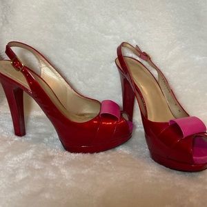 Stuart Weitzman size 8 red Quasar with pink accent bow and peekaboo toe.